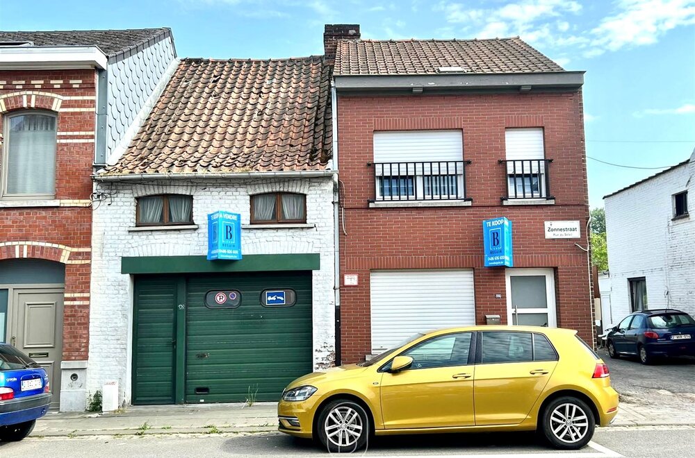 gezellige-instapklare-woning-met-2-slk-garage-magazijn-en-tuintje-001.jpg