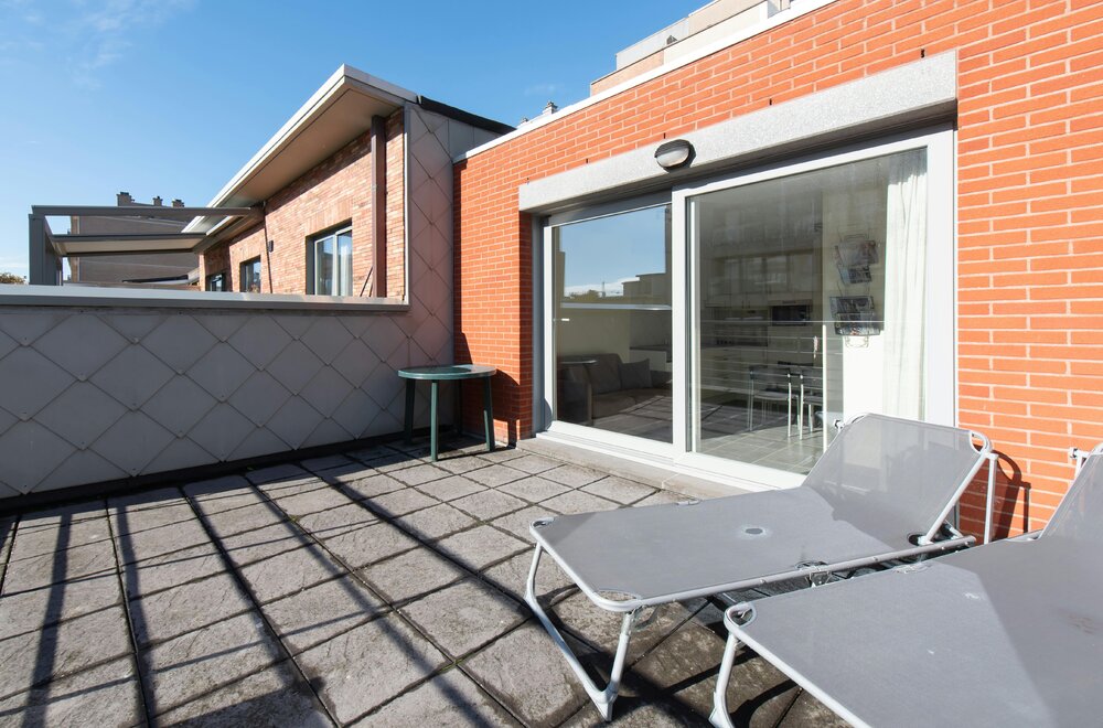 zuidgerichte-penthouse-studio-met-ruime-terrassen-op-topligging-003.jpg