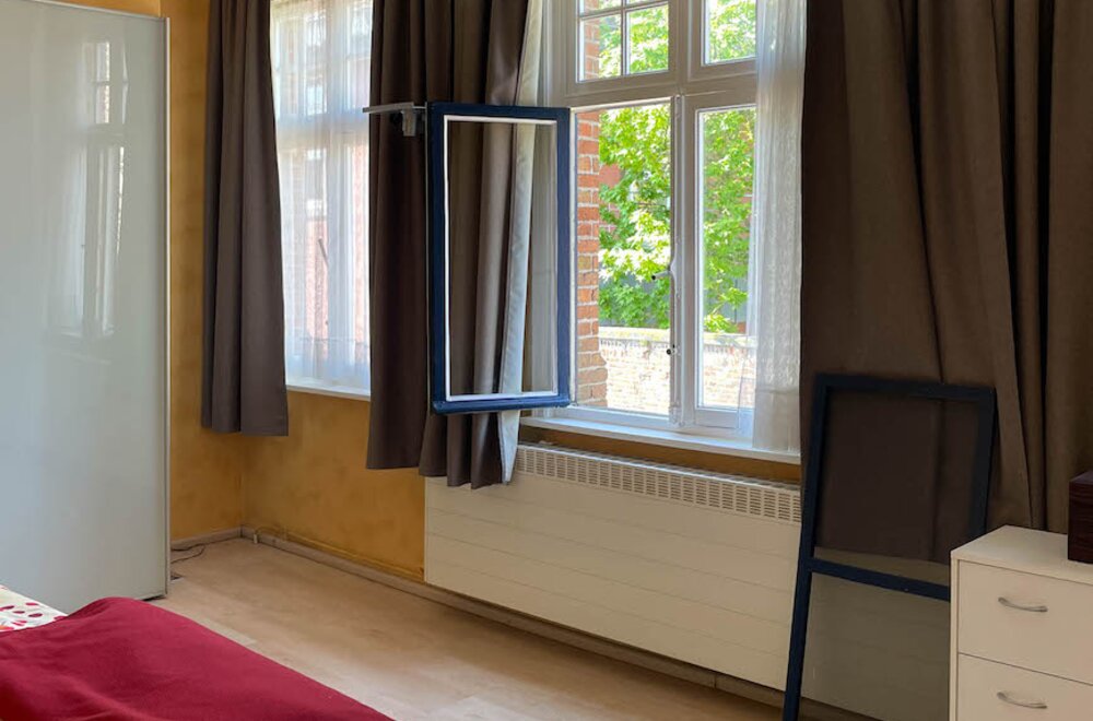 karakterpand-uit-de-late-jaren-20-met-zongerichte-tuinpatio-s-en-authentiek-achterhuis-onbetaalbaar-uitzicht-op-een-historische-kloostertuin020.jpg
