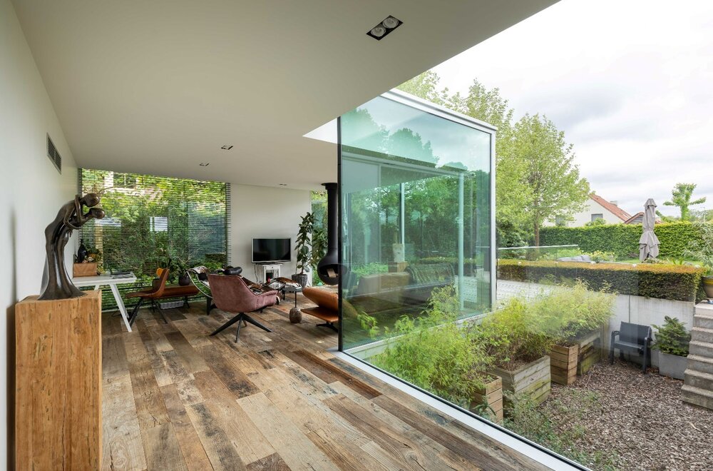 puur-architectuur-sublieme-energiezuinige-villa-met-praktijk-in-het-groen-tussen-oostkamp-en-brugge-011.jpg