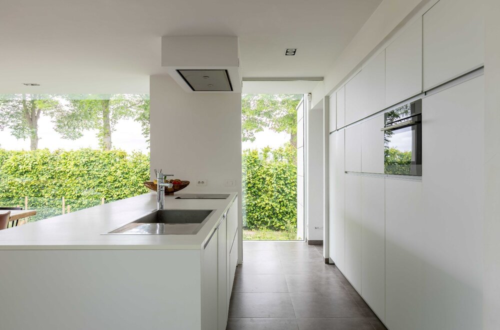 puur-architectuur-sublieme-energiezuinige-villa-met-praktijk-in-het-groen-tussen-oostkamp-en-brugge-015.jpg