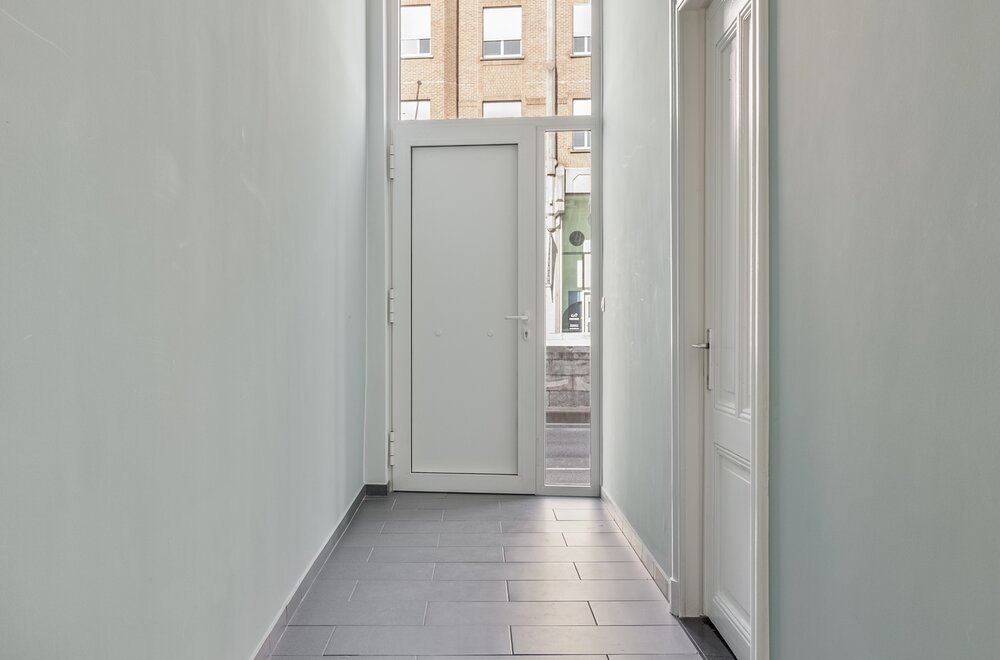 stadswoning-met-5-kamers-en-koer-te-koop-in-centrum-leuven002.jpg