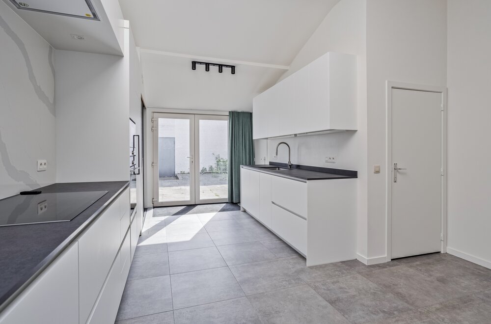 stadswoning-met-5-kamers-en-koer-te-koop-in-centrum-leuven005.jpg