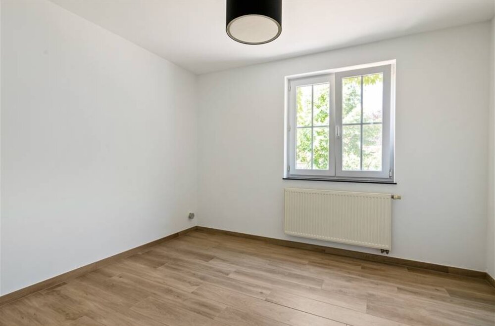 twee-luxueus-afgewerkte-appartementen-met-tuin-025.jpg