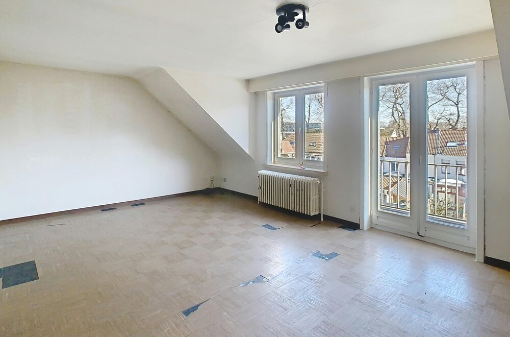building-te-koop-met-3-appartementen-en-10-garageboxen-in-het-hart-van-brugge003.jpg