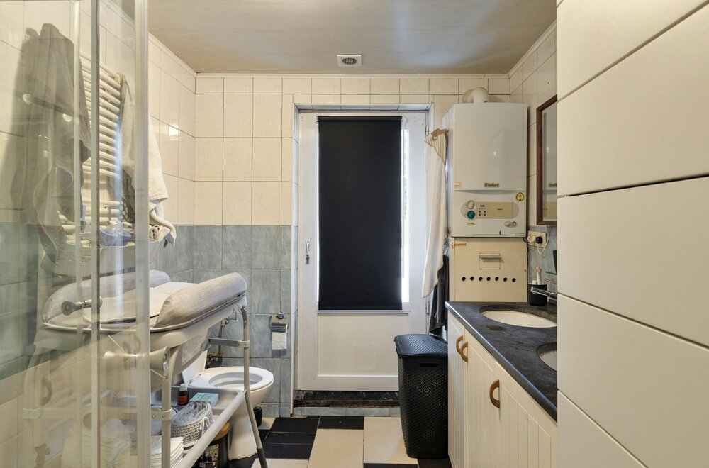 huis-met-tal-van-mogelijkheden-te-koop-in-strombeek-bever-018.jpg