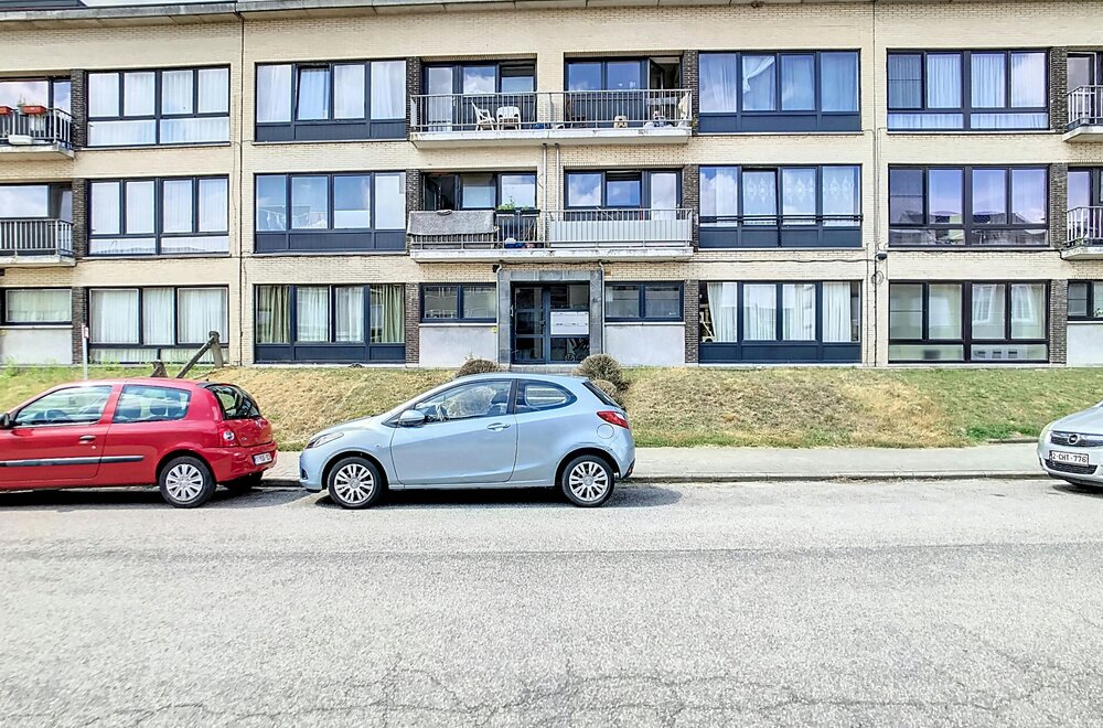 opbrengsteigendom-met-6-appartementen-en-6-garages-in-temse001.jpg