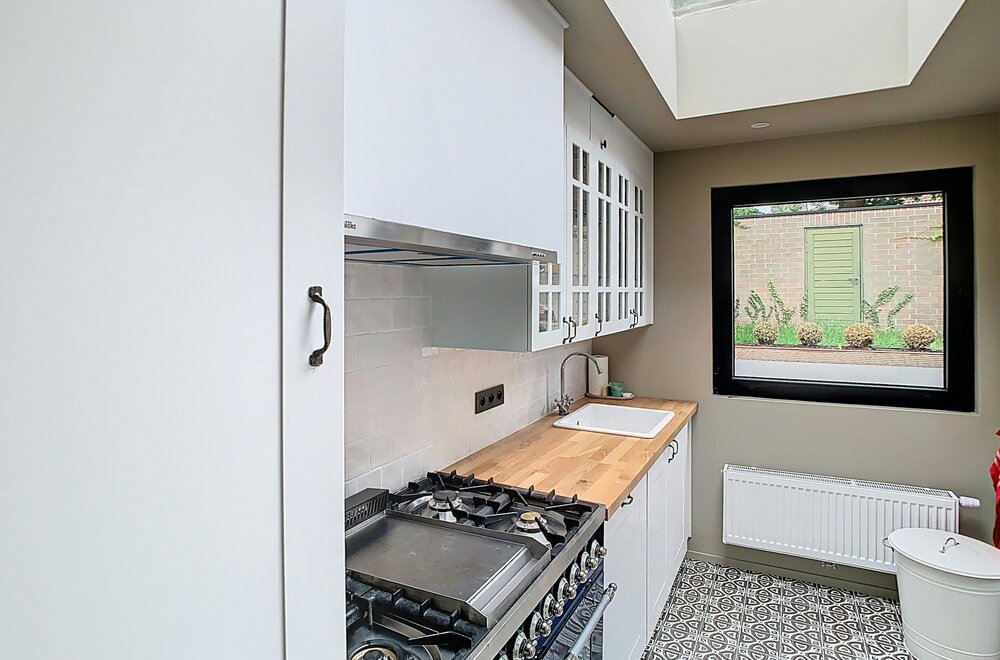 huis-te-koop-met-2-slaapkamers-en-tuin-in-brugge-centrum002.jpg