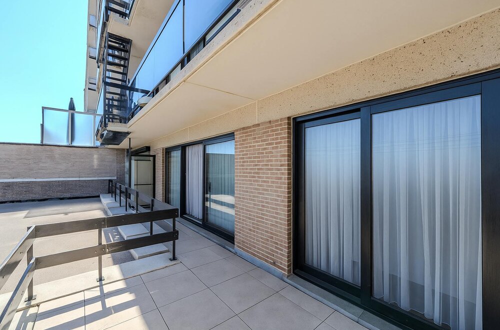 e-n-slaapkamer-appartement-te-koop-met-aangenaam-zonneterras-002.jpg
