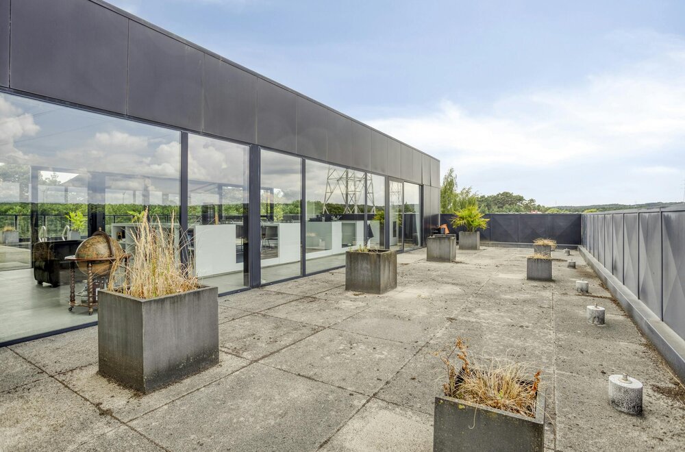 patrimoniumvennootschap-met-drie-bedrijfshallen-en-penthouse016.jpg