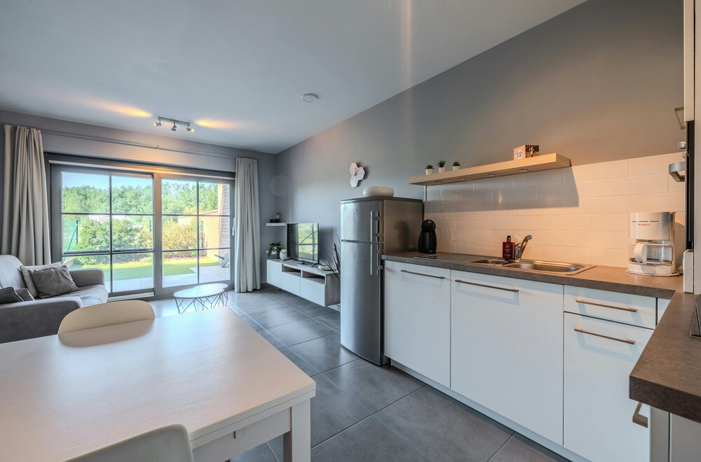 instapklaar-gelijkvloersappartement-met-zongerichte-tuin-005.jpg