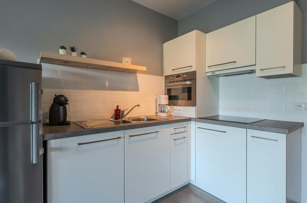 instapklaar-gelijkvloersappartement-met-zongerichte-tuin-007.jpg