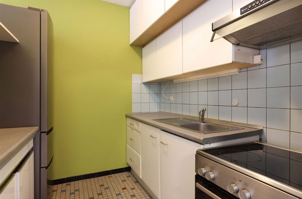 twee-slaapkamer-appartement-met-terras-en-kelderberging-op-toplocatie-in-genk006.jpg