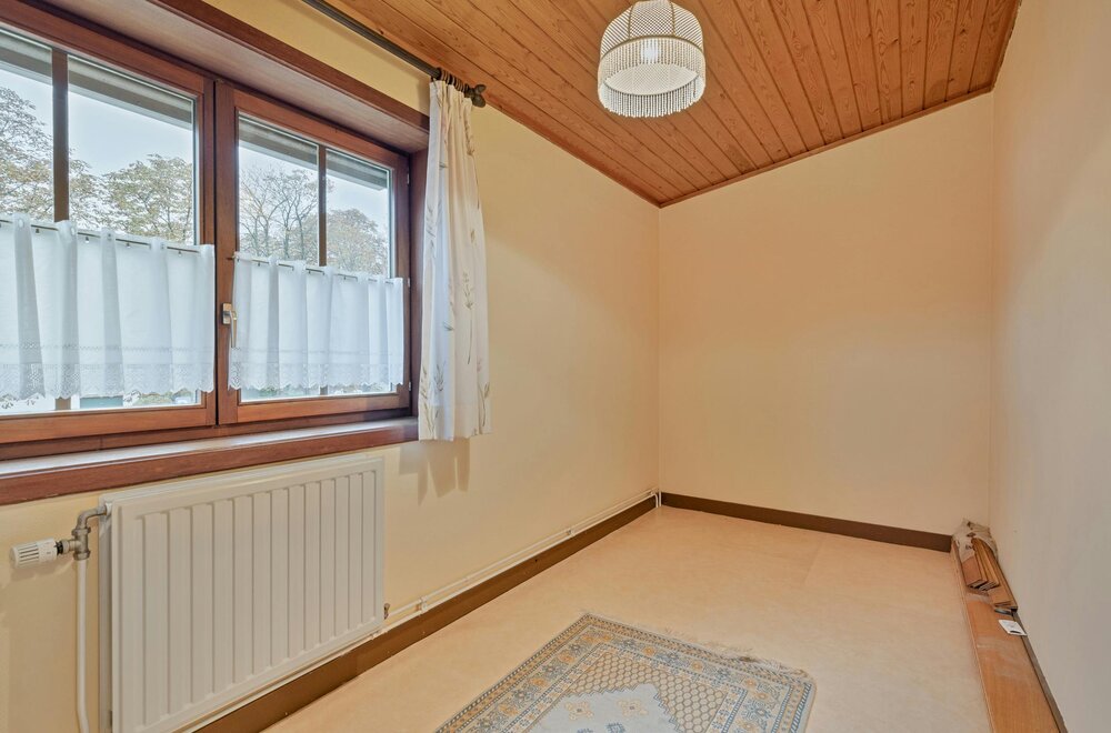 halfopen-woning-met-4-slpk-en-mooie-tuin-te-koop-in-kapellen015.jpg