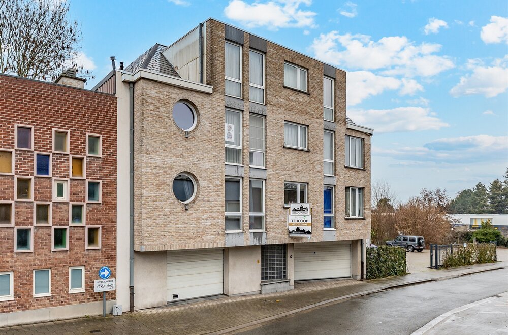 opbrengsteigendom-bestaande-uit-6-appartementen-dubbele-garagebox-en-6-staanplaatsen-te-aalst001.jpg