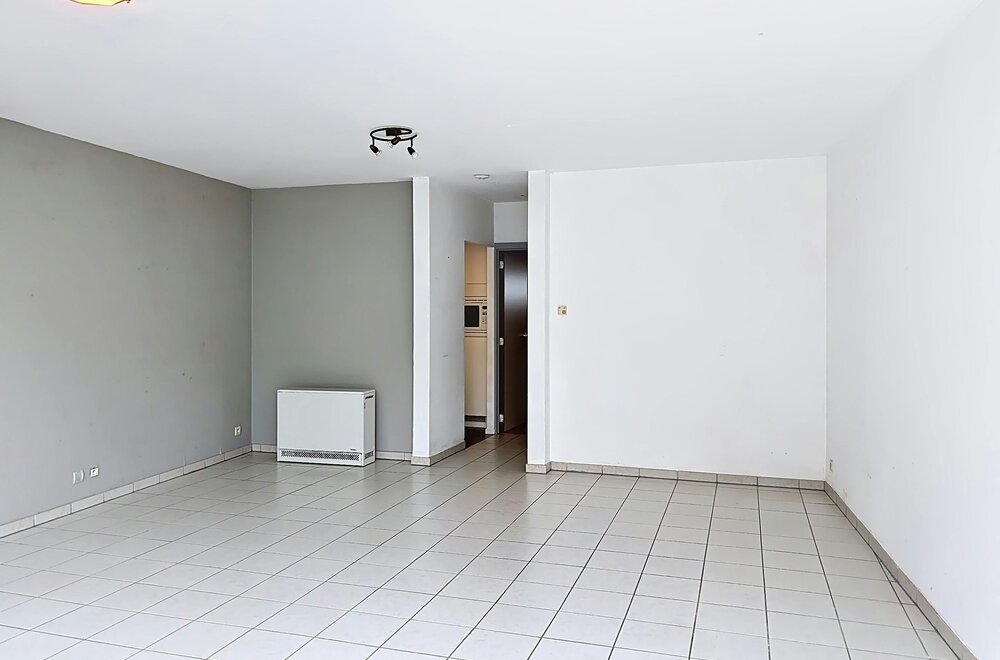 instapklaar-gelijkvloers-appartement-met-gemeenschappelijke-tuin-en-fietsenberging-in-hartje-kapellen-005.jpg