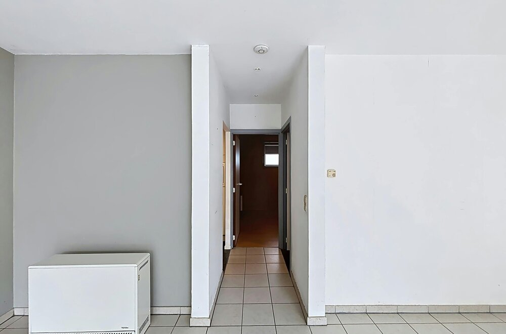 instapklaar-gelijkvloers-appartement-met-gemeenschappelijke-tuin-en-fietsenberging-in-hartje-kapellen-006.jpg