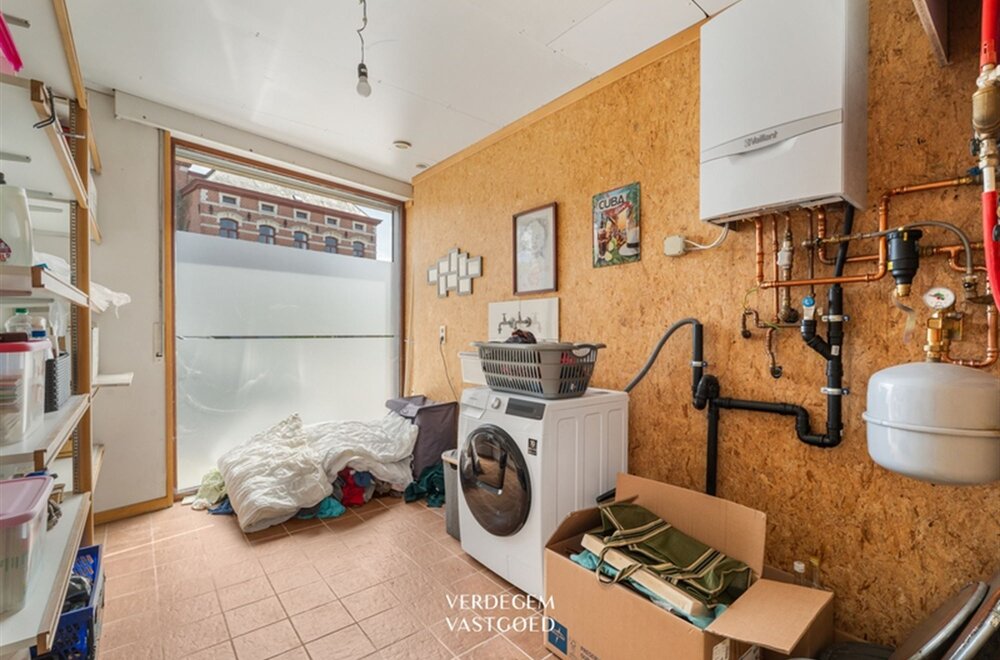 opbrengsteigendom-met-2-appartementen-en-4-garages-in-het-centrum-van-sleidinge-013.jpg