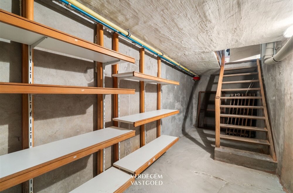 opbrengsteigendom-met-2-appartementen-en-4-garages-in-het-centrum-van-sleidinge-014.jpg