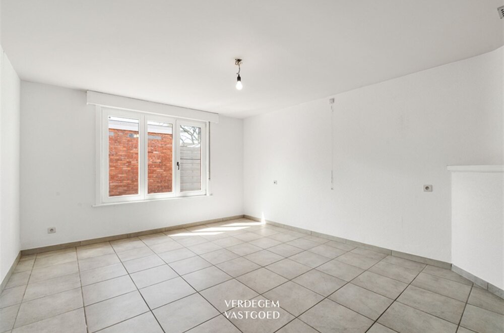 opbrengsteigendom-met-2-appartementen-en-4-garages-in-het-centrum-van-sleidinge-024.jpg