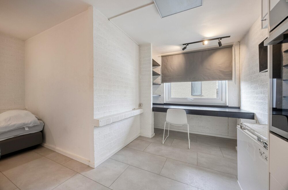 opbrengsteigendom-met-9-studentenkamers-en-duplex-appartement-te-hasselt005.jpg