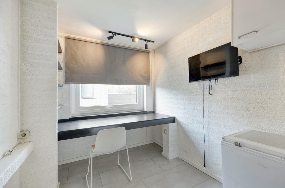 opbrengsteigendom-met-9-studentenkamers-en-duplex-appartement-te-hasselt006.jpg