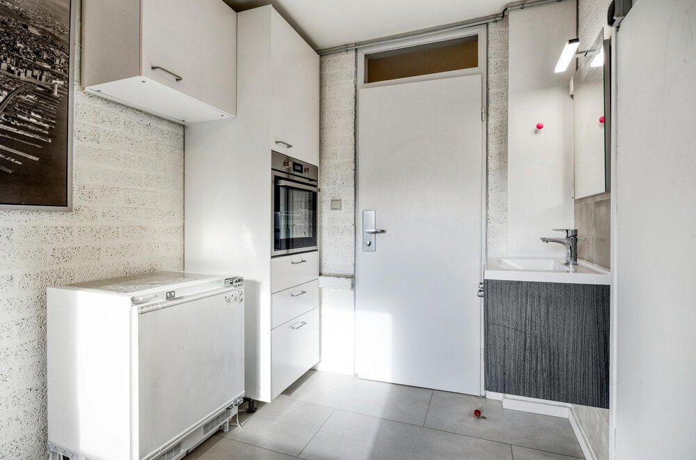 opbrengsteigendom-met-9-studentenkamers-en-duplex-appartement-te-hasselt012.jpg