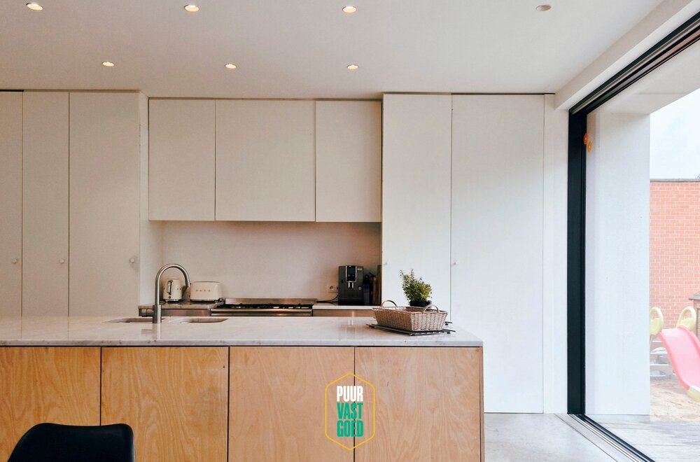 strak-moderne-renovatie-in-dialoog-met-authentieke-charme003.jpg