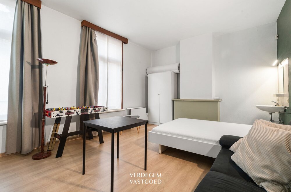 opbrengsteigendom-met-6-studentenkamers-fietsenberging-en-buitenruimte002.jpg
