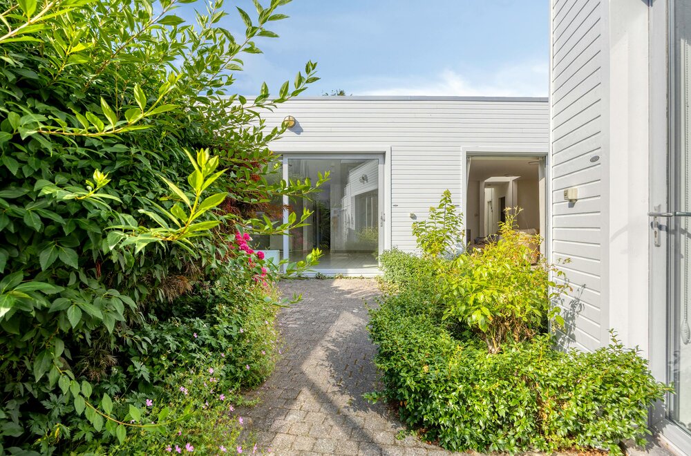 instapklaar-gelijkvloers-appartement-met-gemeenschappelijke-tuin-en-fietsenberging-in-hartje-kapellen-016.jpg
