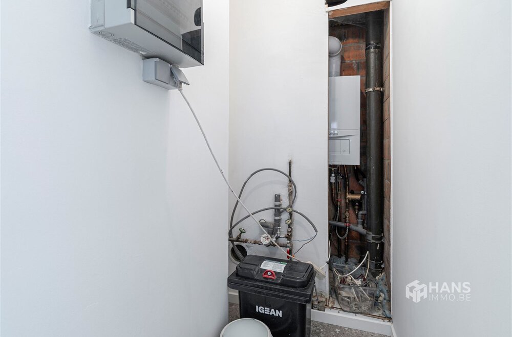 gerenoveerd-appartement-73m-met-2-slaapkamers-garage-en-tuin-in-boechout015.jpg