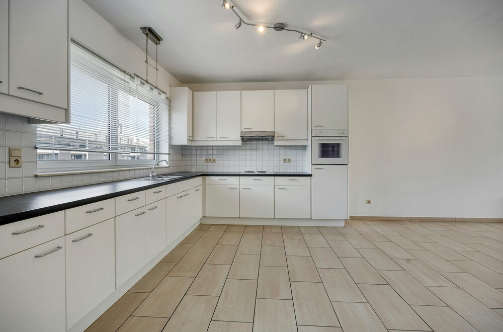 instapklaar-appartement-met-zuidgericht-terras-nabij-centrum-diepenbeek-004.jpg