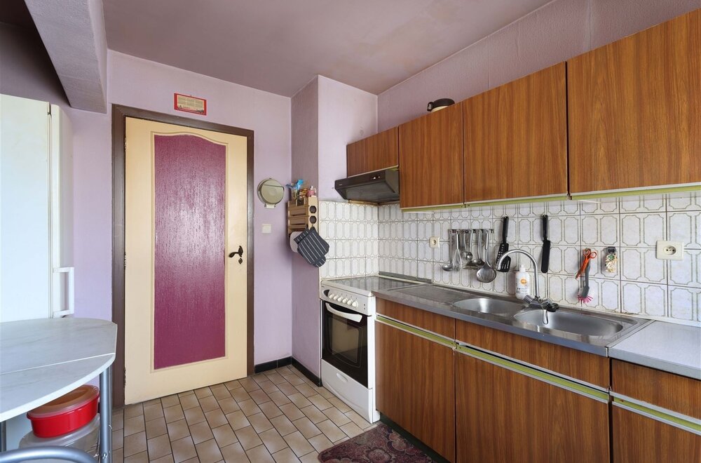 appartement-met-3-slaapkamers-en-ondergrondse-garage-op-toplocatie-in-genk-006.jpg