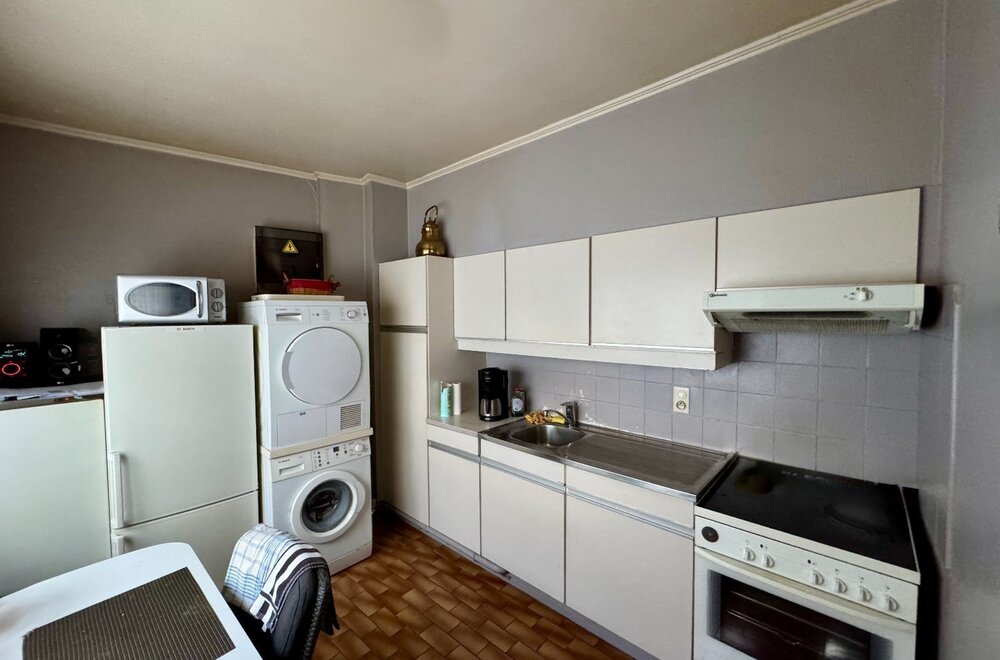 opbrengsteigendom-met-winkel-en-appartementen-op-toplocatie-in-kortrijk011.jpg