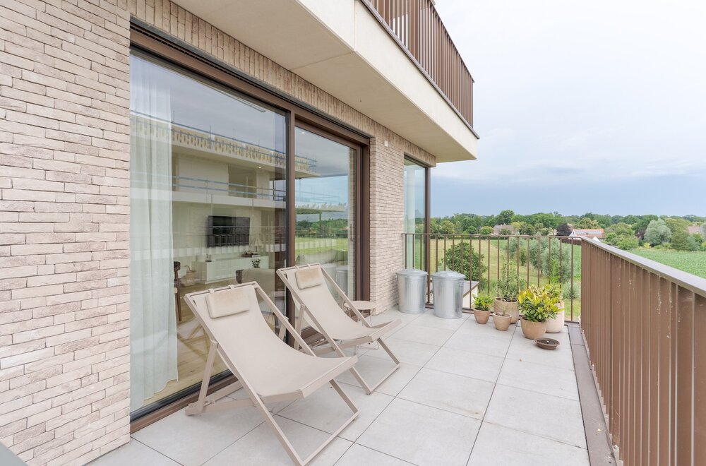 hoogwaardig-afgewerkt-appartement-op-de-derde-verdieping-met-panoramisch-zicht-terras-autostaanplaats-en-berging-010.jpg