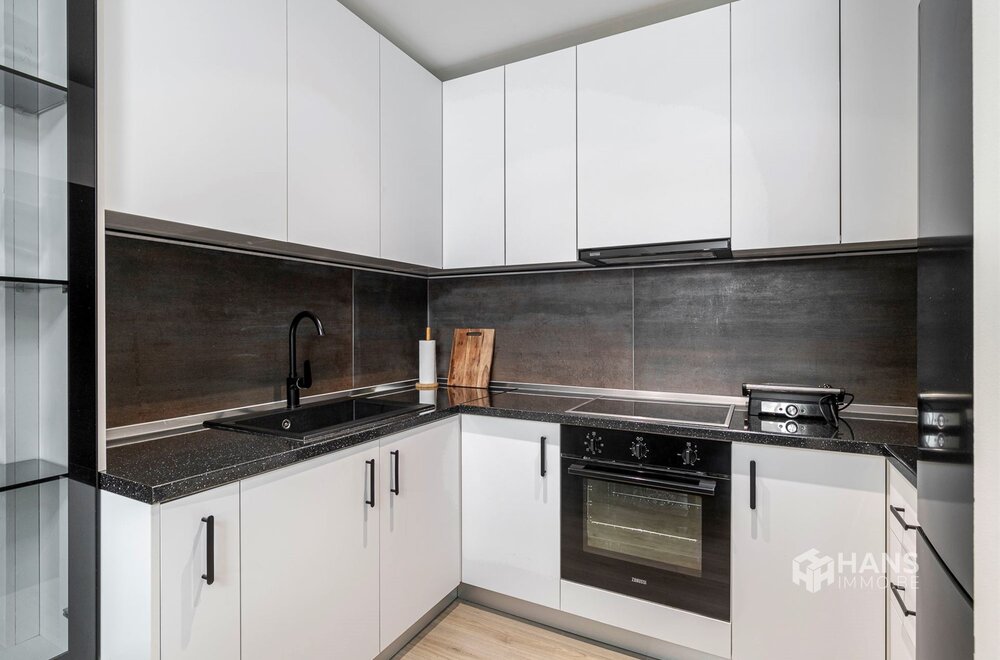 gerenoveerd-appartement-85-m-met-2-slaapkamers-garage-en-terras-3-m-in-deurne-007.jpg