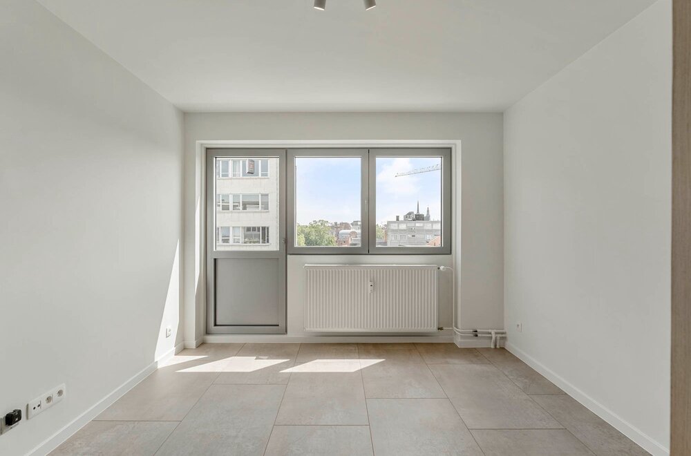 totaalrenovatie-centraal-gelegen-en-hoogwaardig-afgewerkt-appartement-met-1-slaapkamer-en-een-terras-te-leuven-007.jpg