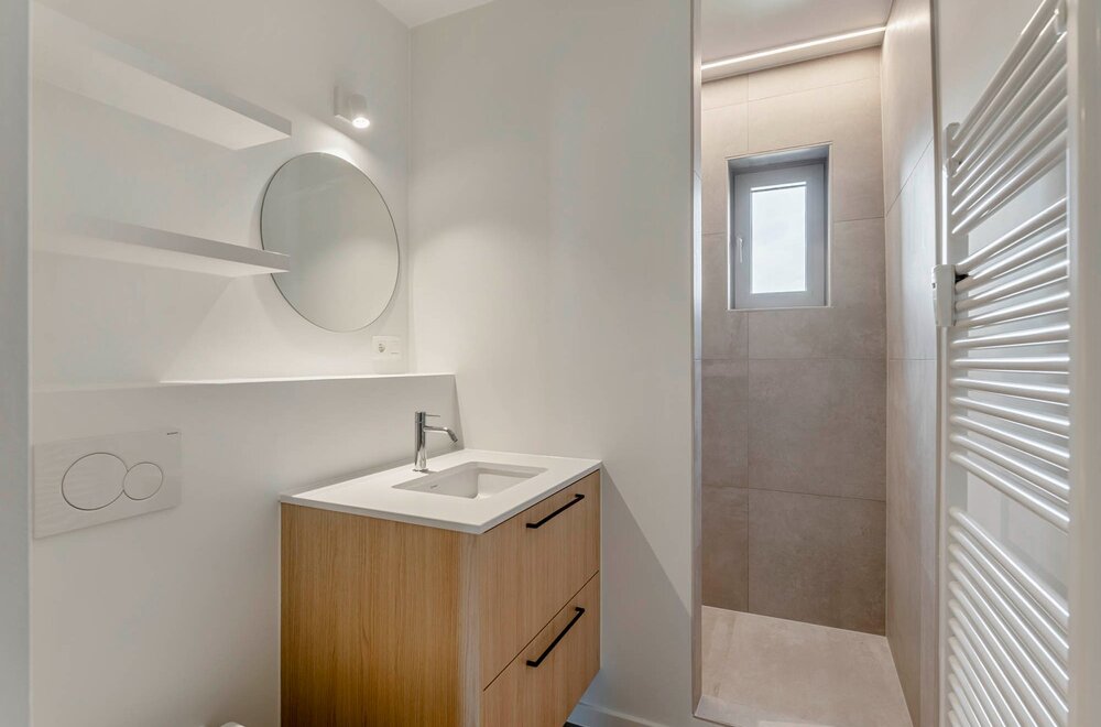 totaalrenovatie-centraal-gelegen-en-hoogwaardig-afgewerkt-appartement-met-1-slaapkamer-en-een-terras-te-leuven-014.jpg