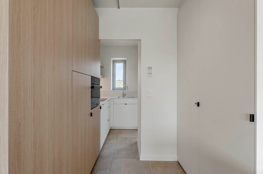totaalrenovatie-centraal-gelegen-en-hoogwaardig-afgewerkt-appartement-met-1-slaapkamer-en-een-terras-te-leuven-018.jpg