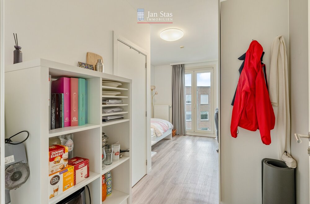 gemeubelde-studentenkamer-met-eigen-sanitair-in-de-recente-en-luxueuze-residentie-de-flint-te-centrum-leuven-008.jpg