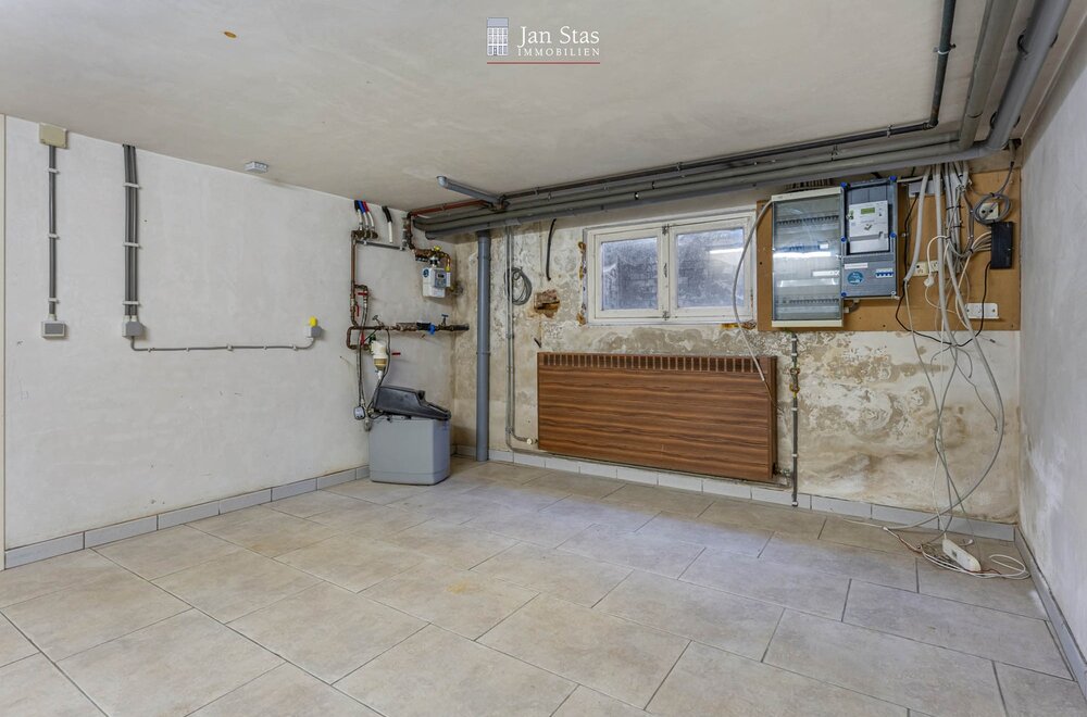 rustig-en-centraal-gelegen-woning-met-4-slaapkamers-terras-en-tuintje-in-leuven-023.jpg