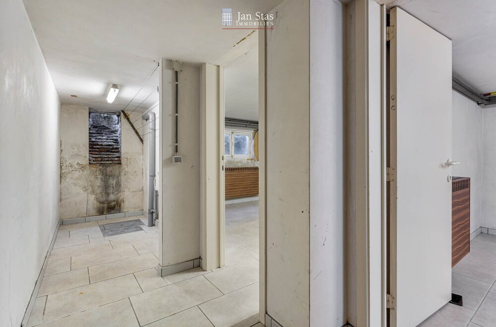rustig-en-centraal-gelegen-woning-met-4-slaapkamers-terras-en-tuintje-in-leuven-024.jpg