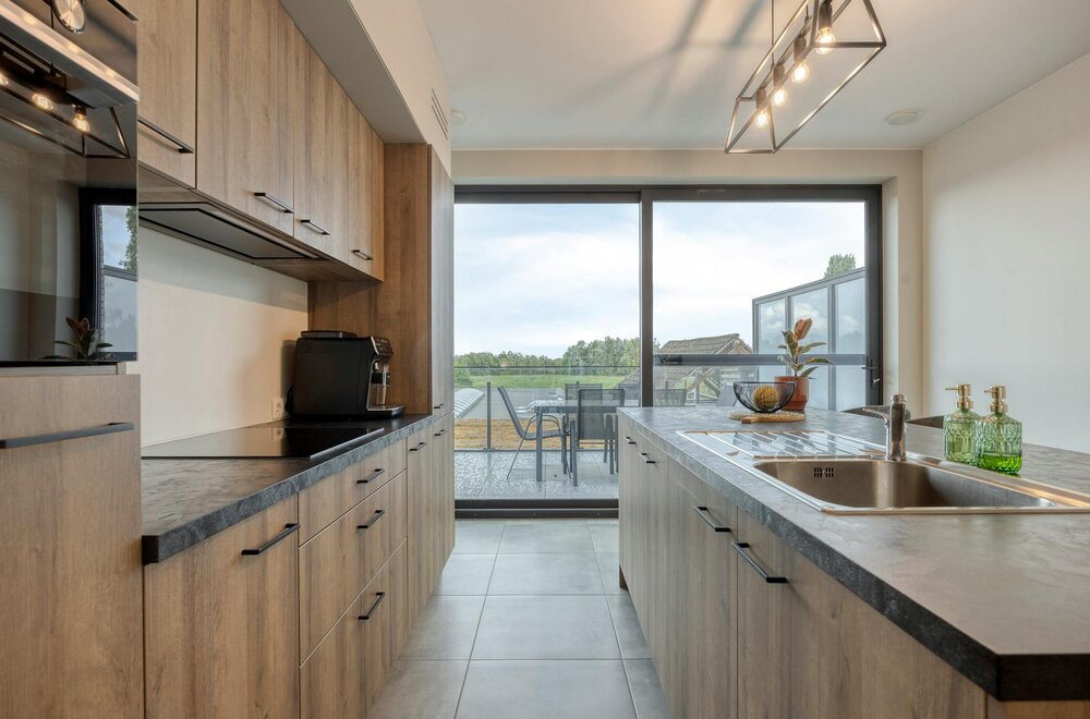 instapklaar-en-energiezuinig-nieuwbouwappartement-met-groot-terras-en-prachtig-uitzicht-in-het-hart-van-londerzeel015.jpg