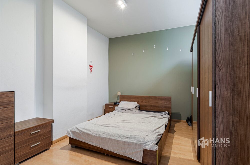 ruim-gelijkvloersappartement-113-m-met-2-slaapkamers-garage-en-tuin-210-m-in-merksem-009.jpg