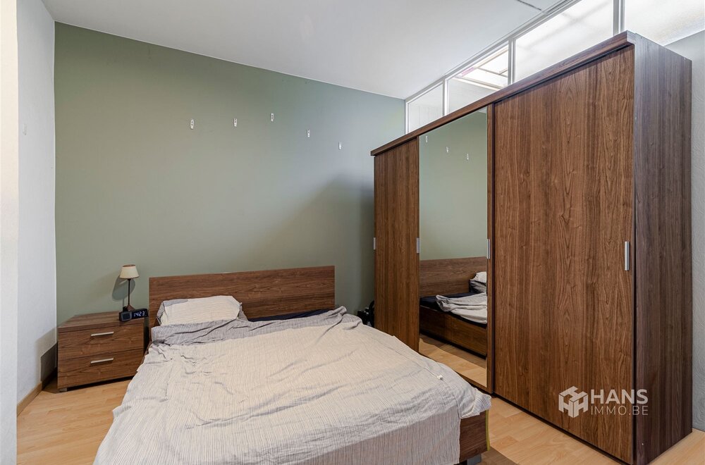 ruim-gelijkvloersappartement-113-m-met-2-slaapkamers-garage-en-tuin-210-m-in-merksem-010.jpg