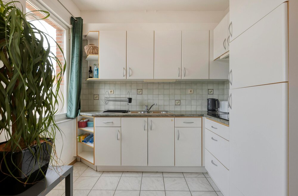 duplex-met-2-slaapkamers-terras-en-garage-te-koop-in-mortsel-006.jpg