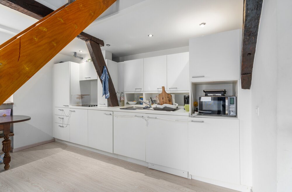 opbrengsteigendom-1-handelszaak-amp-3-appartement-te-leuven009.jpg