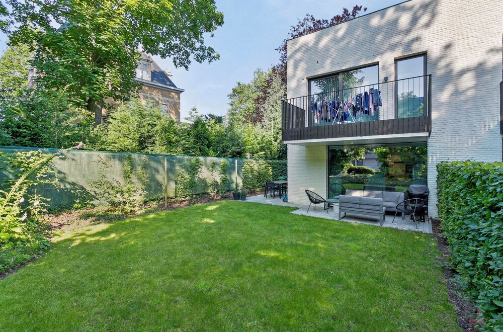 instapklaar-gelijkvloers-appartement-met-tuin-terras-en-2-autostaanplaatsen-in-olsene001.jpg