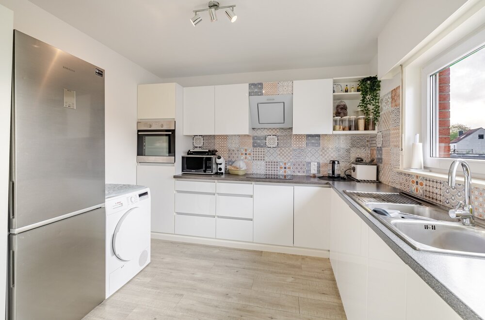 appartement-op-de-eerste-verdieping-met-drie-slaapkamers-en-garage007.jpg