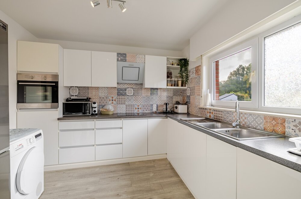 appartement-op-de-eerste-verdieping-met-drie-slaapkamers-en-garage008.jpg
